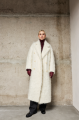 Long women's coat of white color